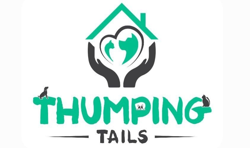 Thumping Tails Logo